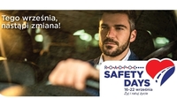 Zdjęcie kolorowe, mężczyzna za kierownicą i napis safety days